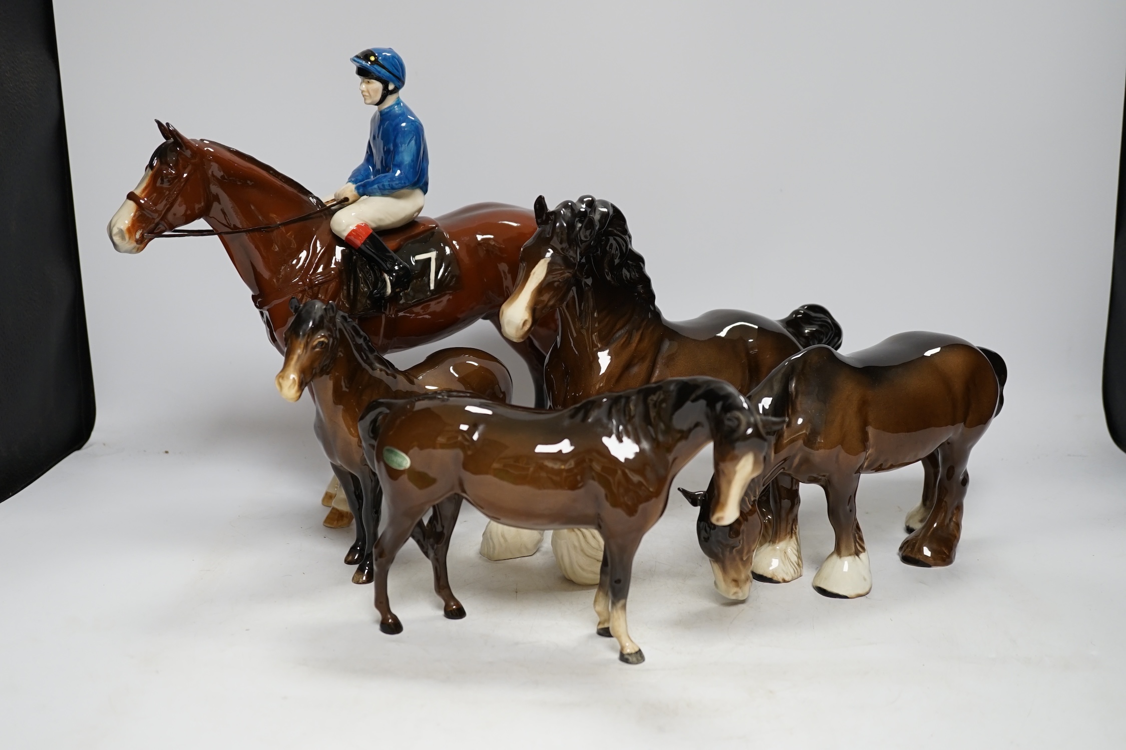 A group of five Beswick horse models including a limited edition ‘Racehorse and Jockey Bay’ 139/250, tallest 29cm. Condition - fair to good